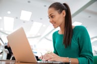 how critical thinking can be applied in school and life in general Portrait of a happy female student using laptop computer in university