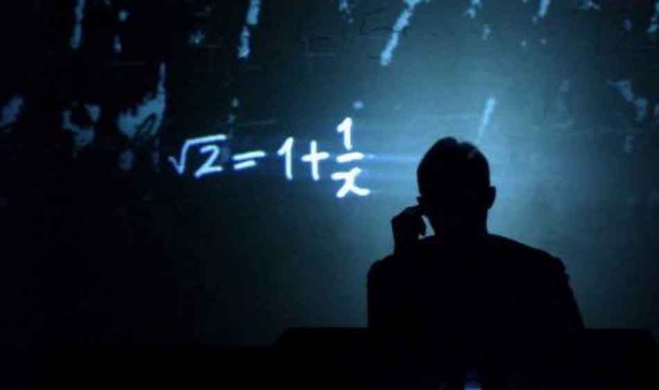 A mathematical sum is projected with a shadowy figure infront of it in Complicité A Disappearing Number.