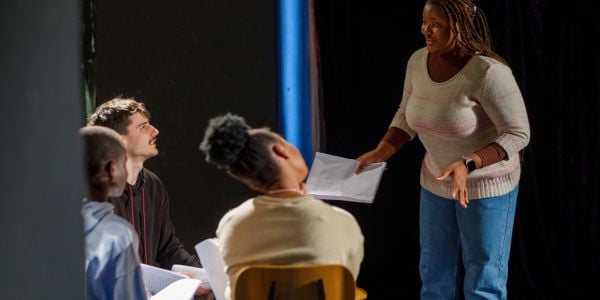 Students in an a theatre 