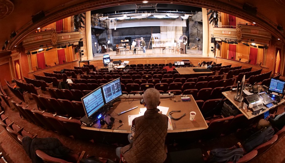 View of a theatre stage from the back of the auditorium 