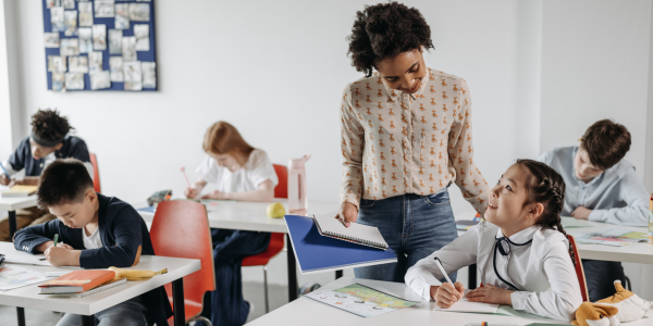 Teacher talking to student